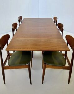 Parker table and 6 Parker model 107 chairs"